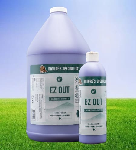 A bottle of ez out is next to an empty container.