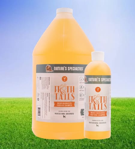 A bottle of liquid and a gallon of liquid on grass.