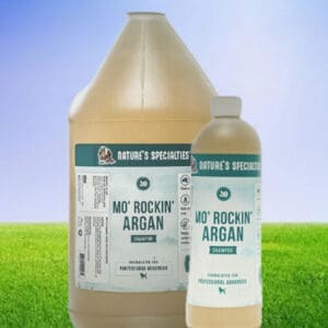 A bottle of argan oil and a gallon of argan oil.