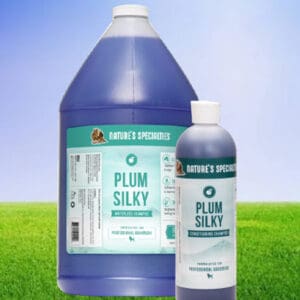 A bottle of liquid and a container of liquid on the grass.